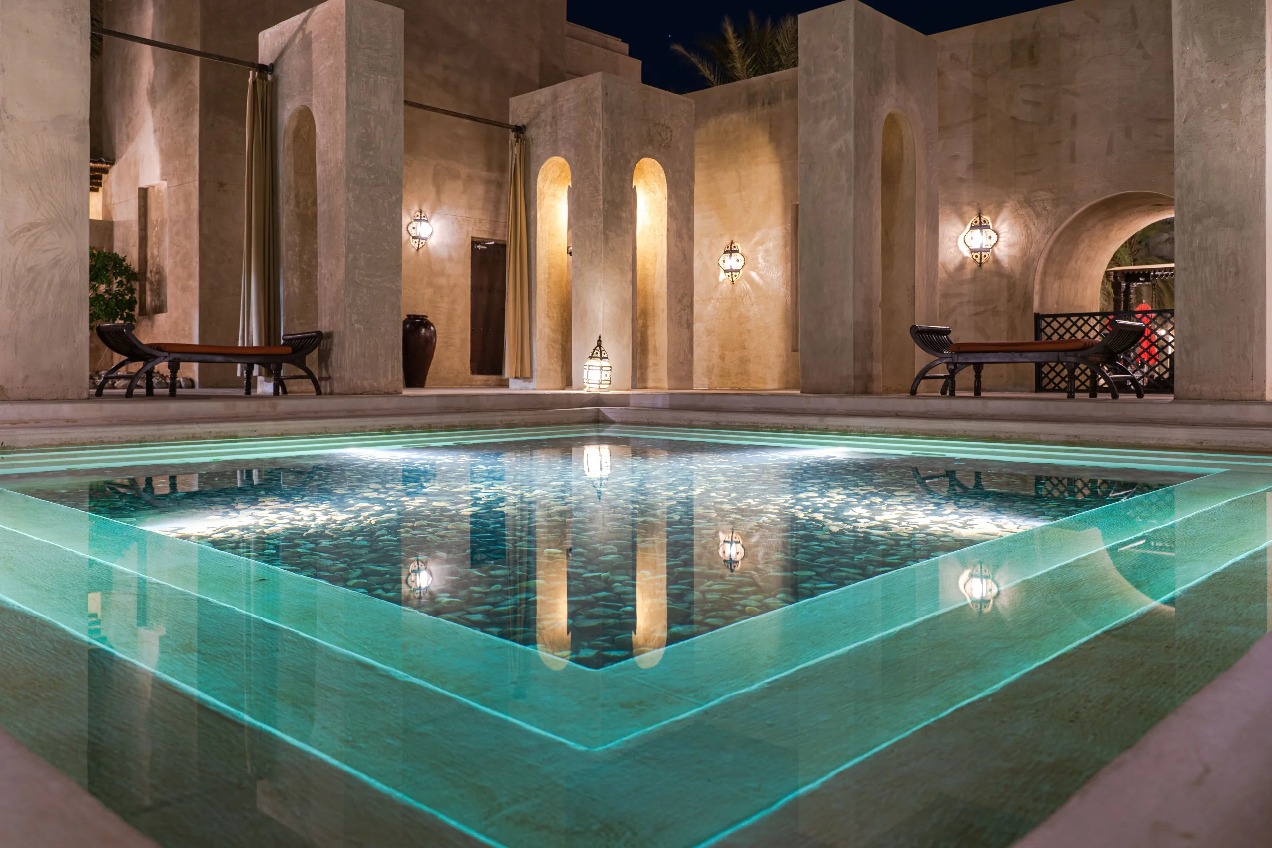 Bespoke hero — discreet private villa at dusk